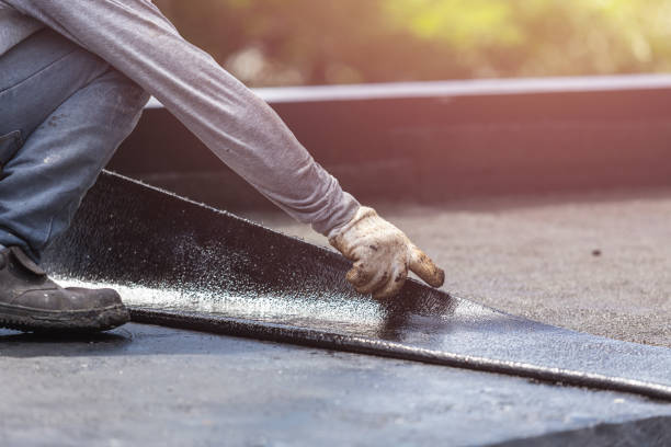 Professional Waterproofing technician working in Davidson, NC